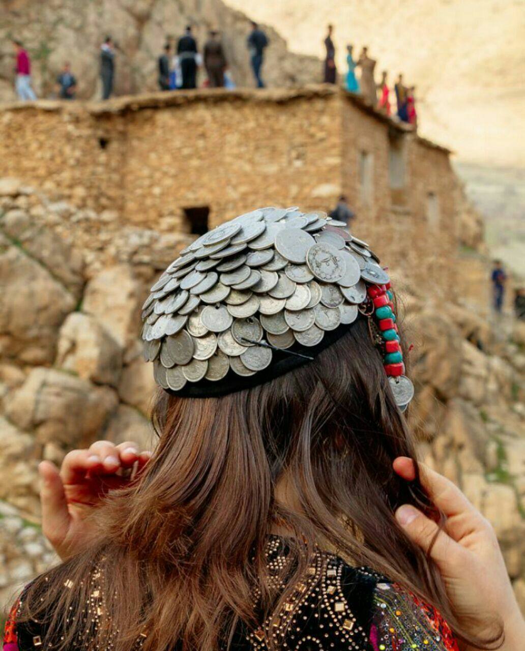 Traditional Hawraman headwear decorated with coins